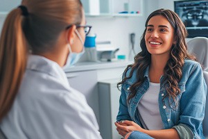 Dentist and patient discussing treatment plan