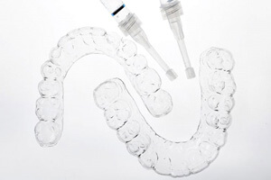 professional take-home whitening trays against plain background