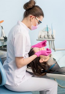 a patient receiving dental care from a dentist near Tyler