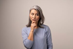 Mature woman showing thoughtful, concerned expression